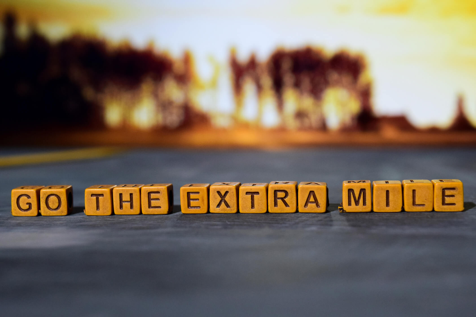 blocks that spell go the extra mile