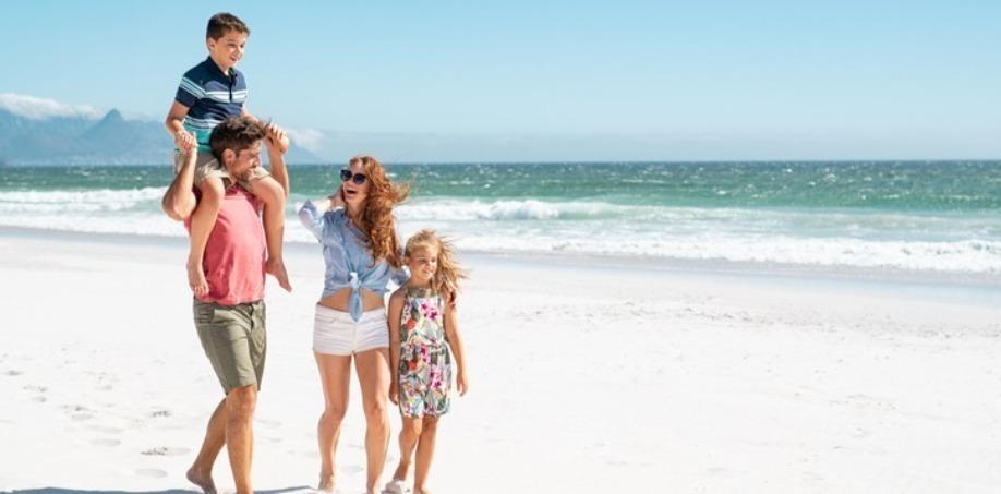 Family walking on the beach
