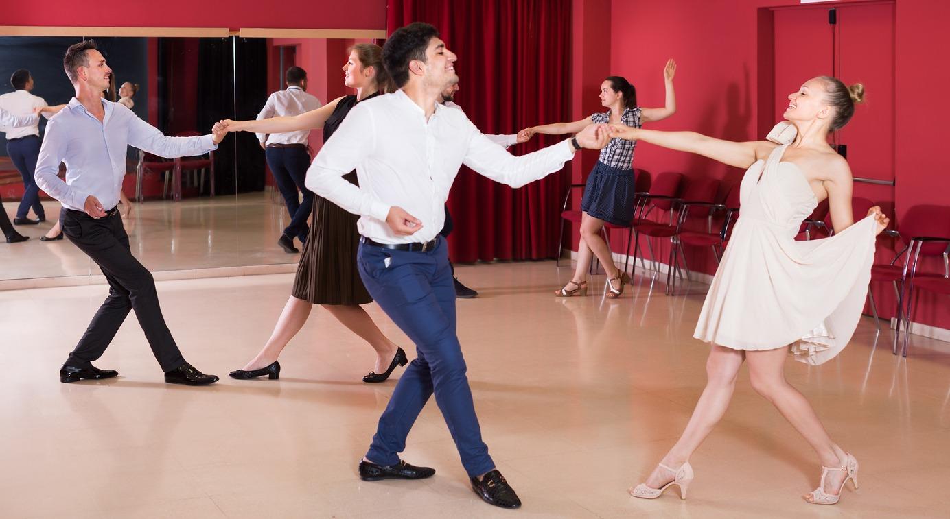 couples dance in a club to the Carolina shag dance.